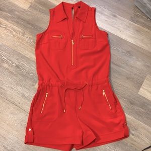 Sharagano romper with zipper, snap, & tie details
